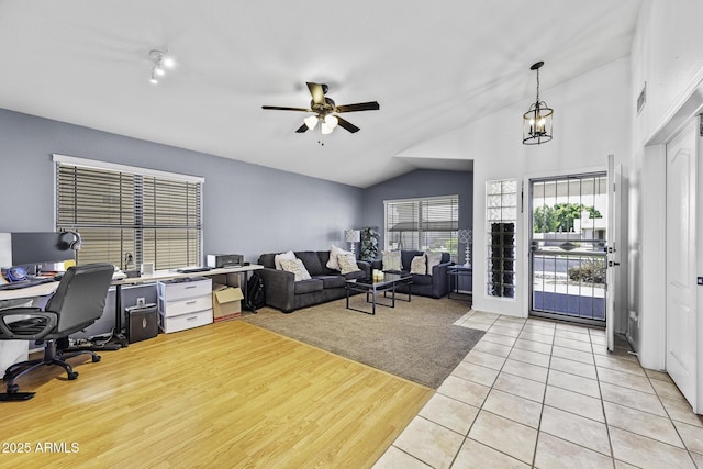 7832 E Osage Ave, Mesa, AZ 85212 - living room with a ceiling fan, light wood-style flooring, and vaulted ceiling
