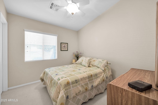 bedroom with ceiling fan and light colored carpet