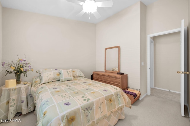 bedroom with light colored carpet and ceiling fan