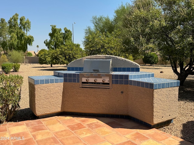 view of patio featuring area for grilling