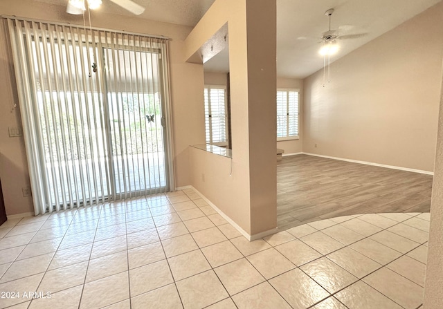 unfurnished room featuring ceiling fan and light hardwood / wood-style flooring