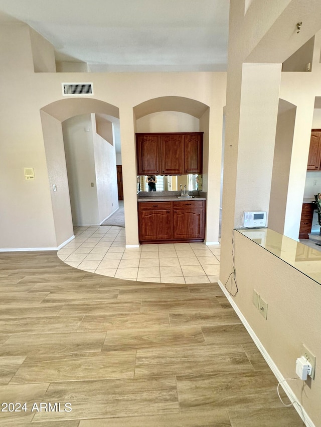 kitchen with light tile patterned floors