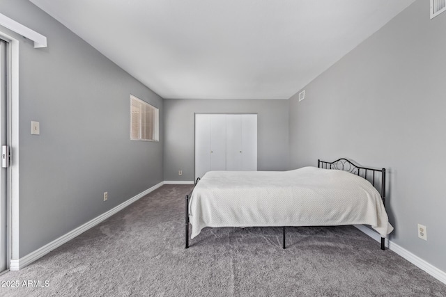 bedroom with a closet and carpet flooring