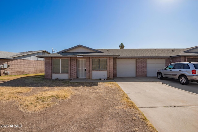 single story home featuring a garage