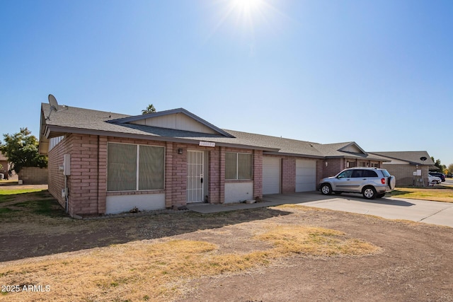 single story home with a garage