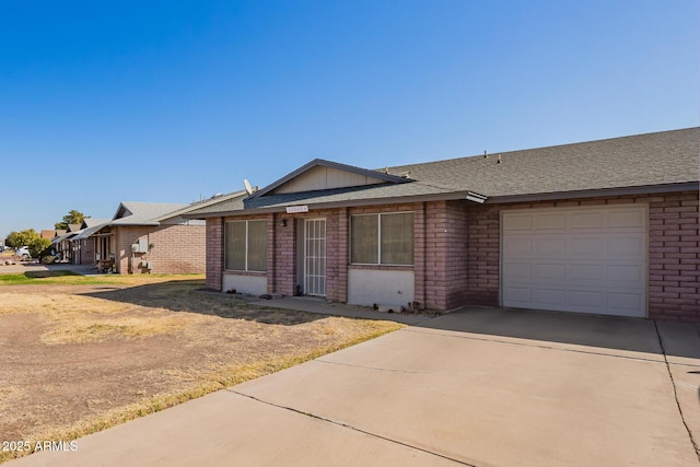 single story home featuring a garage