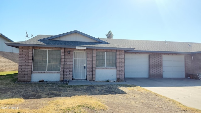 single story home with a garage