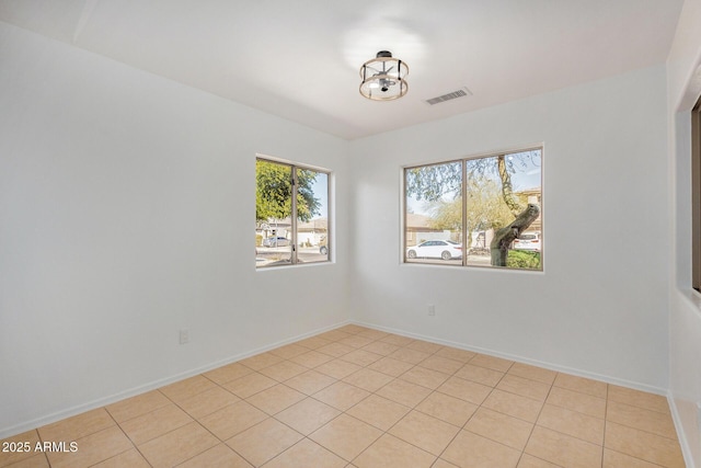 view of tiled spare room