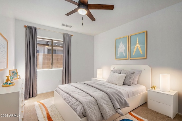 carpeted bedroom with ceiling fan