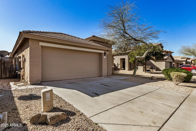 view of front of house featuring an outbuilding and a garage