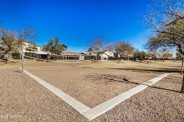 view of yard featuring volleyball court