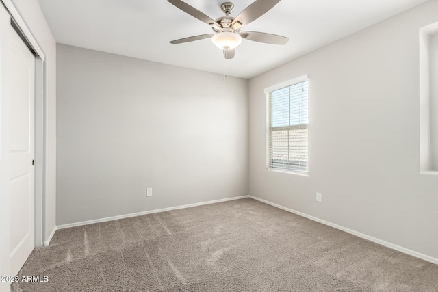 5113 E Greenway St E, Mesa, AZ 85205 - unfurnished bedroom featuring carpet, a closet, and ceiling fan