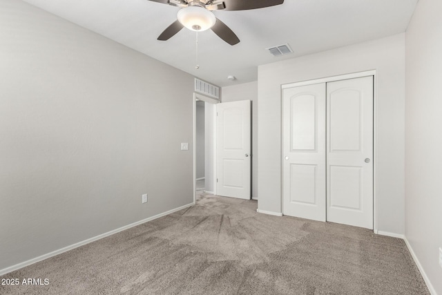 5113 E Greenway St E, Mesa, AZ 85205 - unfurnished bedroom with carpet, a closet, and ceiling fan