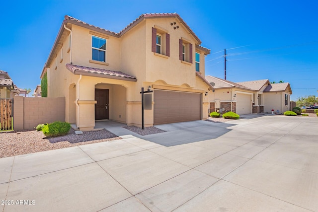 5113 E Greenway St E, Mesa, AZ 85205 - view of front of house featuring a tiled roof, stucco siding, an attached garage, and concrete driveway