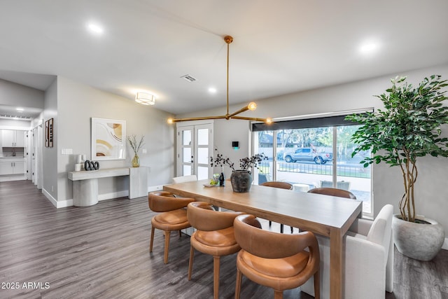 dining space with french doors, recessed lighting, dark wood-style floors, and a healthy amount of sunlight