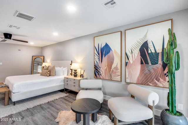 bedroom featuring recessed lighting, visible vents, and wood finished floors