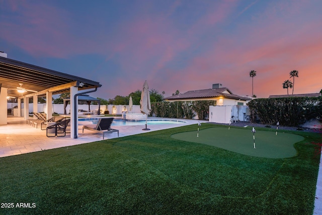view of yard featuring a fenced in pool, a fenced backyard, a gazebo, and a patio