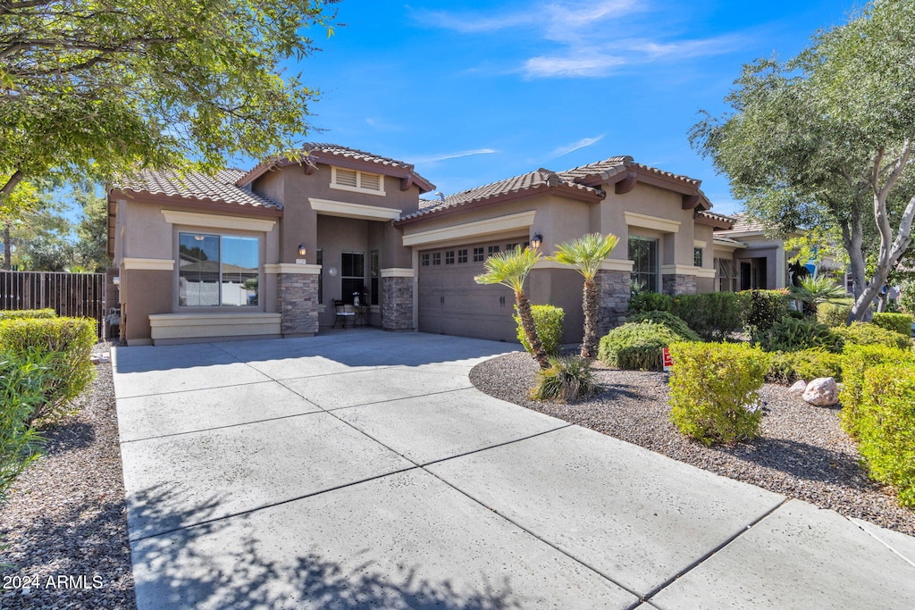 view of front of home with a garage