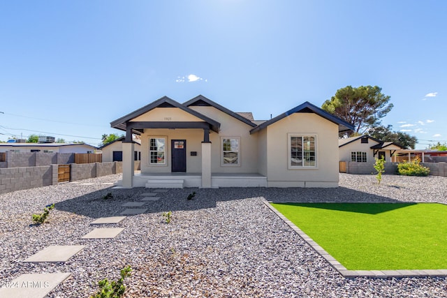 view of front of property with a front lawn