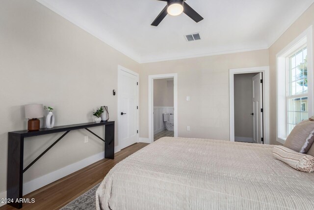 1921 E Yale St, Phoenix, AZ 85006 - bedroom featuring dark wood-style flooring, connected bathroom, and ceiling fan