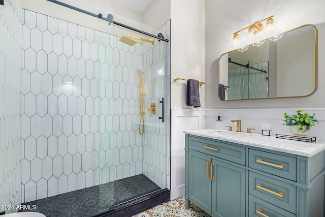 bathroom featuring vanity and a tile shower