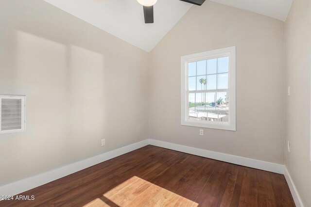 1921 E Yale St, Phoenix, AZ 85006 - spare room with a ceiling fan, dark wood finished floors, and vaulted ceiling