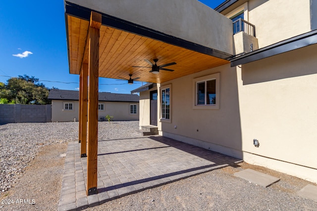 view of patio featuring ceiling fan