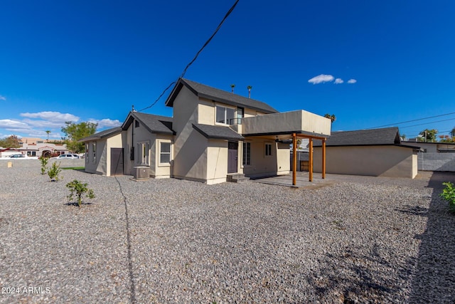 1921 E Yale St, Phoenix, AZ 85006 - rear view of house with ceiling fan, a patio, stucco siding, and a balcony