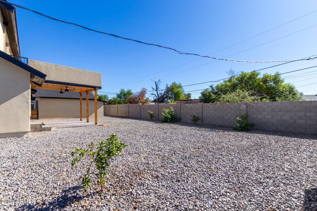 1921 E Yale St, Phoenix, AZ 85006 - fenced backyard featuring a patio area
