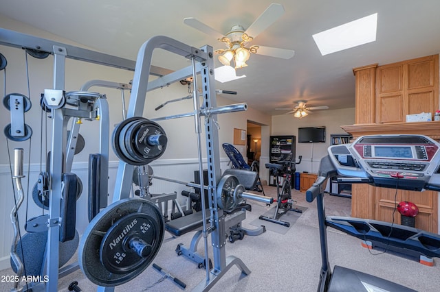 workout area featuring ceiling fan