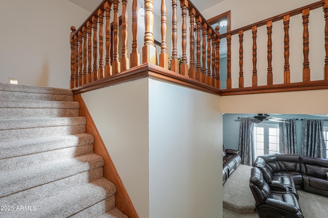 stairway featuring french doors