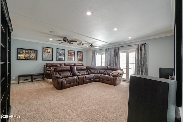 living room featuring french doors, light colored carpet, and crown molding