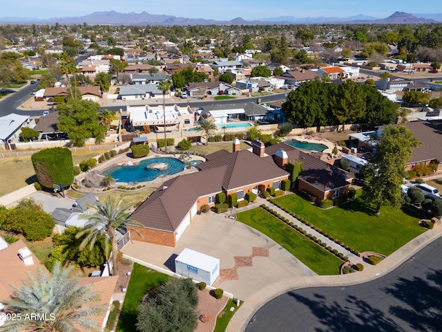 bird's eye view with a residential view and a mountain view