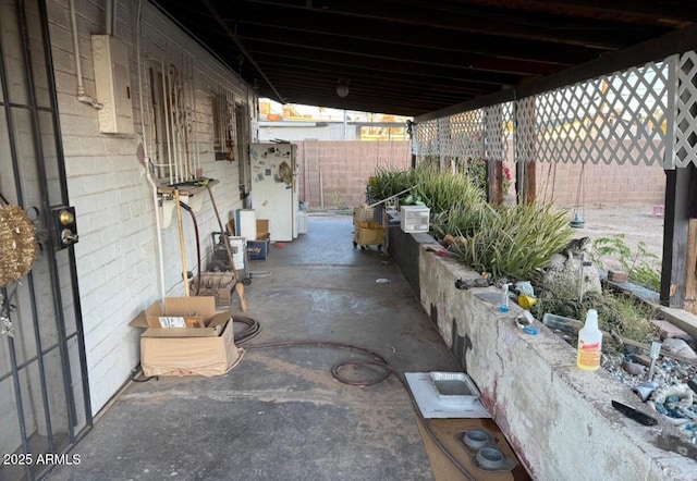 view of patio / terrace with fence