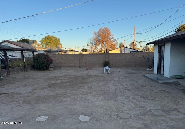 view of yard with a fenced backyard