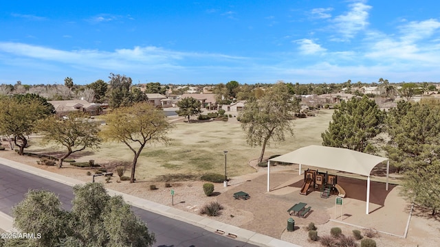 birds eye view of property with a residential view