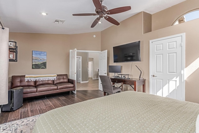 24813 N 55th Dr, Glendale, AZ 85310 - bedroom featuring wood finished floors, high vaulted ceiling, ceiling fan, baseboards, and recessed lighting