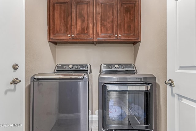 24813 N 55th Dr, Glendale, AZ 85310 - laundry room featuring washing machine and dryer and cabinet space