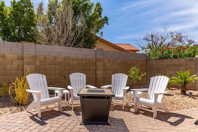 24813 N 55th Dr, Glendale, AZ 85310 - view of patio / terrace featuring an outdoor fire pit