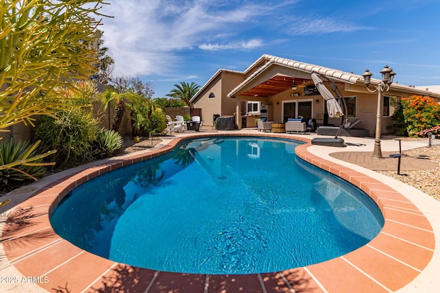 24813 N 55th Dr, Glendale, AZ 85310 - view of pool with an outdoor living space, a patio area, and a fenced backyard