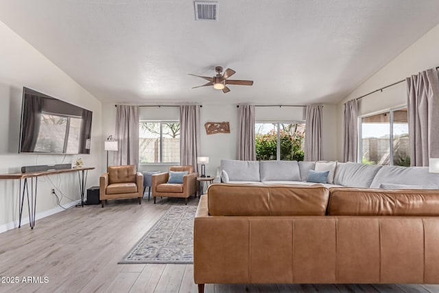 24813 N 55th Dr, Glendale, AZ 85310 - living area featuring lofted ceiling, ceiling fan, and light wood-style floors