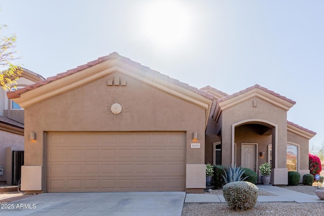 view of front of property with a garage