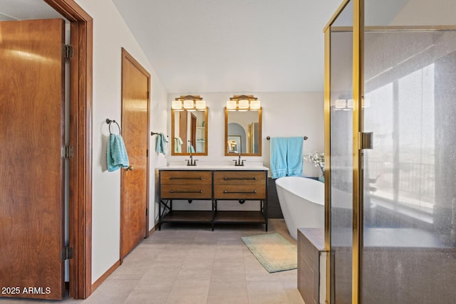 bathroom featuring a soaking tub, a shower stall, and double vanity