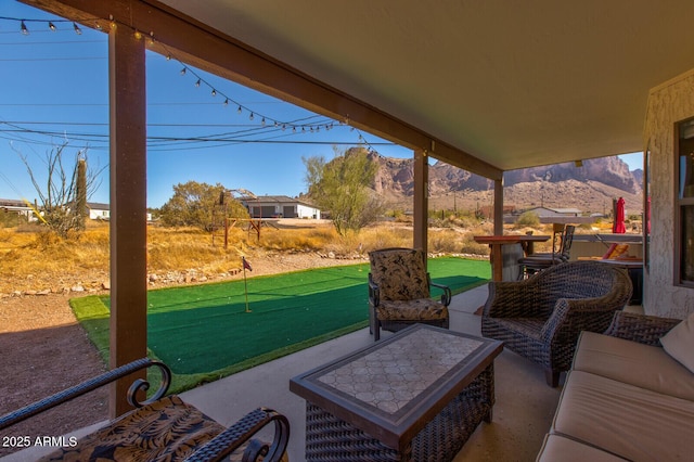 view of patio featuring a mountain view