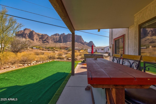 view of patio featuring a mountain view