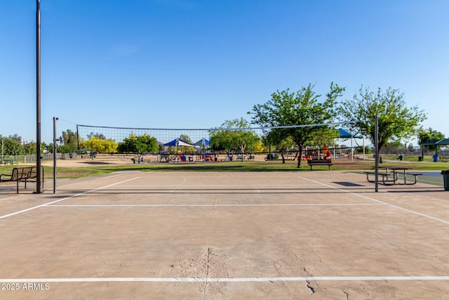 view of home's community featuring fence
