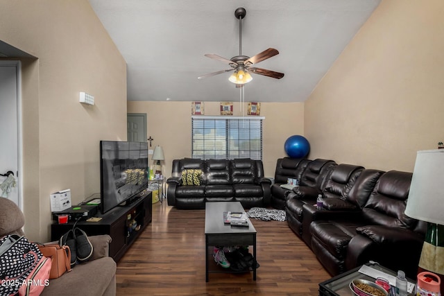 living area with lofted ceiling, a ceiling fan, and wood finished floors