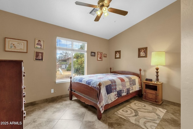 bedroom with vaulted ceiling, light tile patterned floors, and ceiling fan