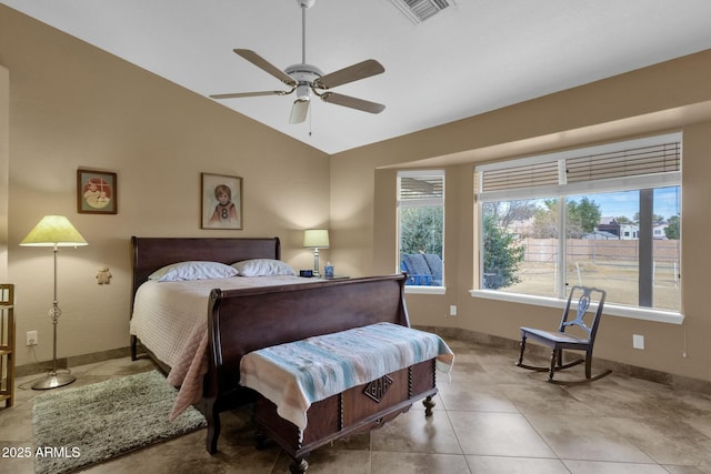 bedroom featuring vaulted ceiling, light tile patterned flooring, and ceiling fan