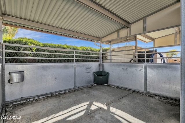 view of patio / terrace featuring an outbuilding